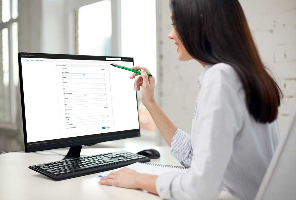 HR Woman using papervision at her desk